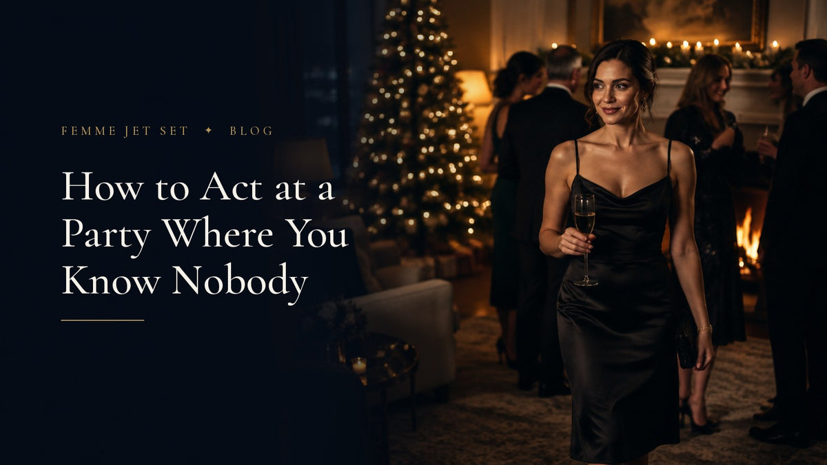Elegant woman in a black silk dress arriving alone at a candlelit holiday cocktail party in a townhouse with a Christmas tree, How to Act at a Party Where You Know Nobody cover