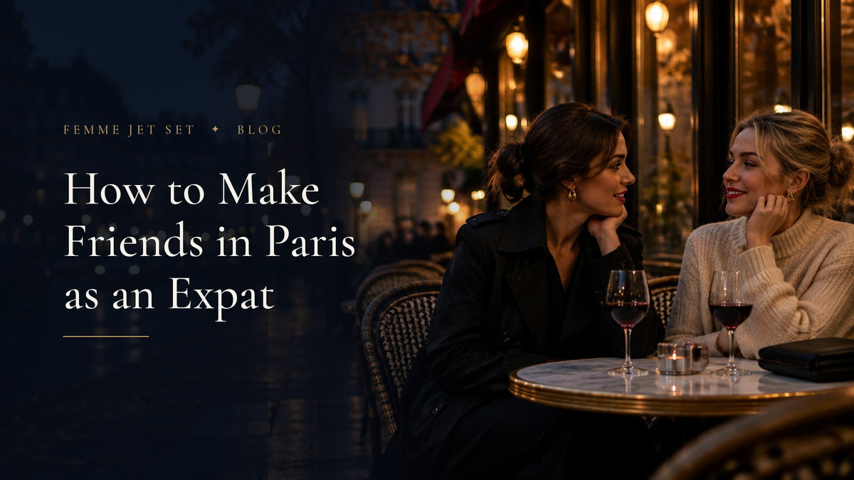 Two chic women chatting over red wine at a marble table on a Parisian café terrace at dusk, How to Make Friends in Paris as an Expat cover