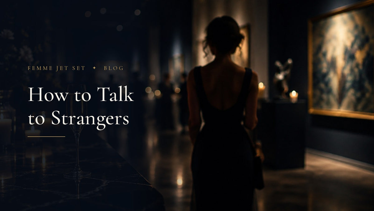Silhouette of a woman from behind at a candlelit gallery with a champagne flute on black marble, Talk to Strangers cover