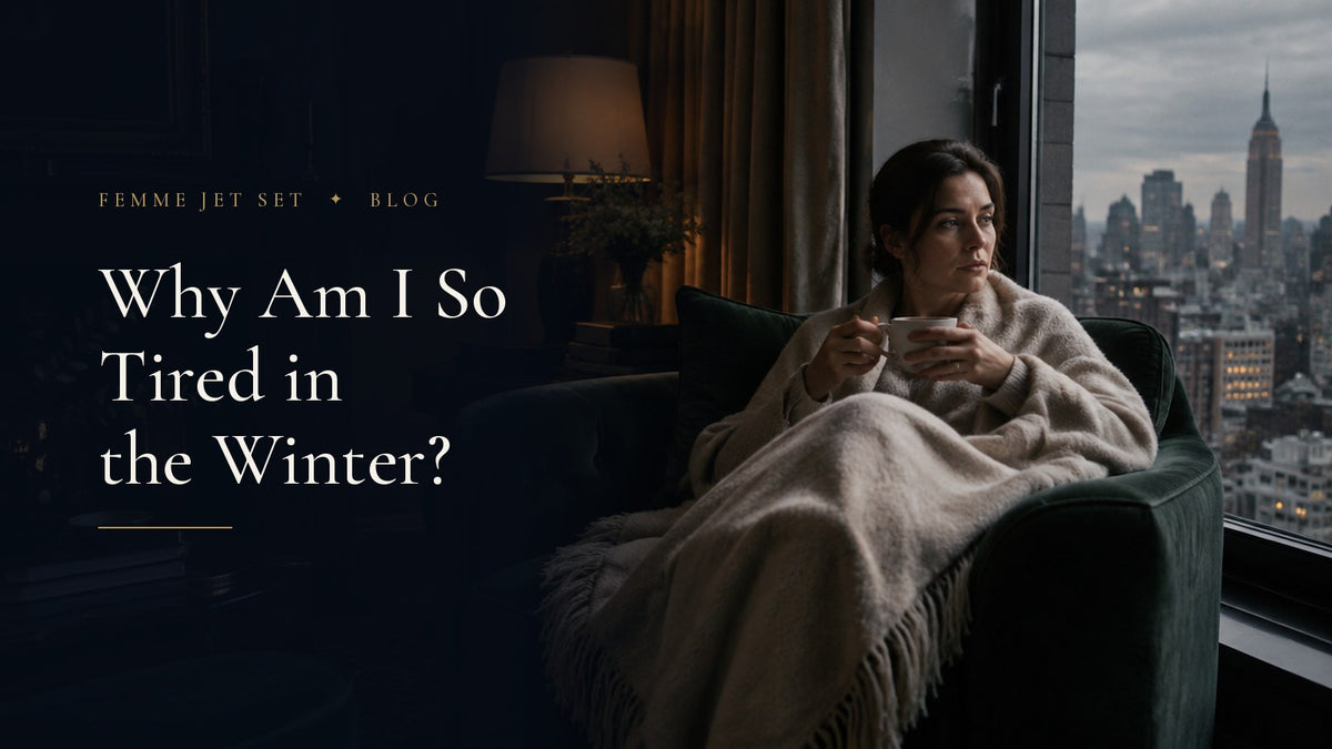 Woman wrapped in an ivory cashmere throw on a green velvet armchair by a Manhattan window on a grey winter afternoon, Why Am I So Tired in the Winter cover